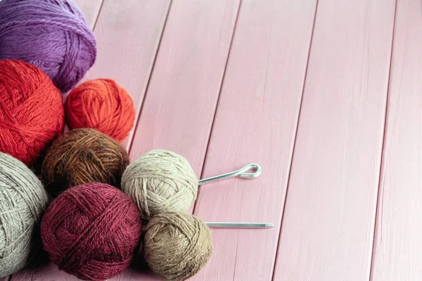 Balls Yarn Different Colors Knitting Needles Background Pink Wood Textur — kuvapankkivalokuva