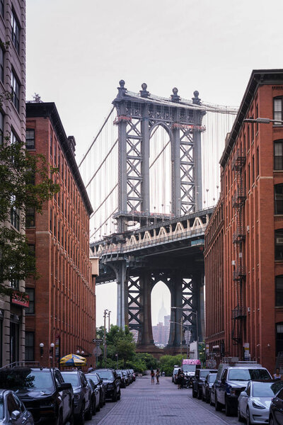 New York City, USA - August 6, 2019:view of the famous manhattan bridge from Brooklyn, Dumbo during a foggy day,