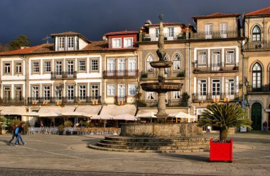 Main square Largo de Camoes with the fountain clipart