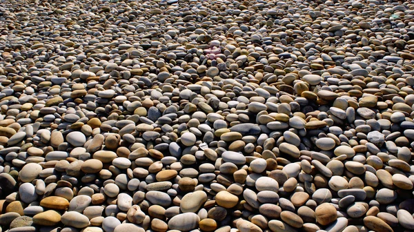 Beach rolling stones