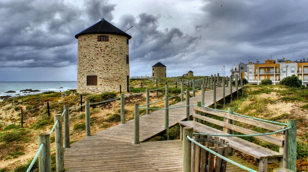 Apulia windmill in the beach — Stock Photo, Image