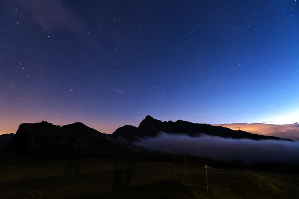 Nacht landschap in het pass Rolle Stockfoto