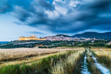 Historic town of Assisi at dusk, Umbria, Italy clipart