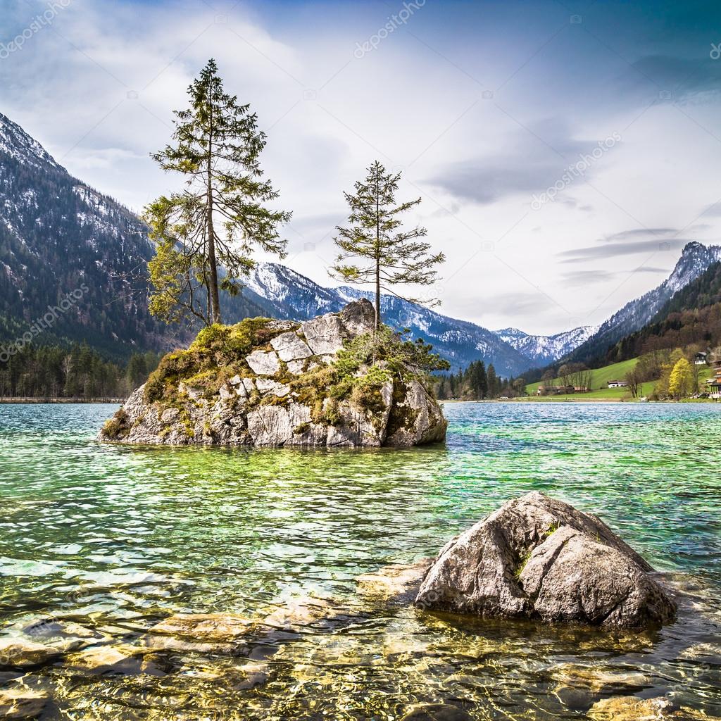Idyllic landscape with trees on a rock at lake Hintersee, Nationalpark Berchtesgadener Land, Bavaria, Germany