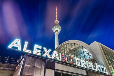 Berlin Alexanderplatz neon sign with TV tower at night, Germany