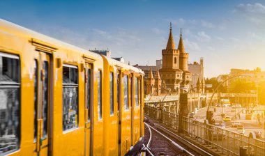 Berlin U-Bahn with Oberbaum Bridge at sunset, Berlin Friedrichshain-Kreuzberg, Germany