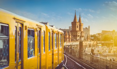 Berlin U-Bahn with Oberbaum Bridge at sunset, Friedrichshain-Kreuzberg, Germany