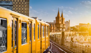 Berlin U-Bahn with Oberbaum Bridge at sunset, Friedrichshain-Kreuzberg, Germany