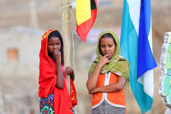 Schoolgirls under the national flag. Berahile-Ethiopia. 0380 — Stock Photo, Image