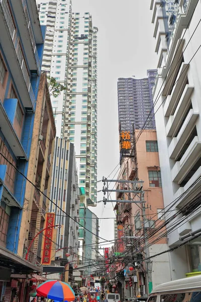 Gigantic mess of electric cables placed between the high-rise condominium buildings outlining Ongpin Street of Binondo district-oldest Chinatown in the world founded by the Spanish. Manila-Philippines