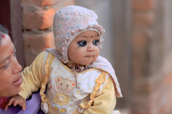 Eye-painted little baby. Godawari-Nepal. 0975 — Stock Photo, Image