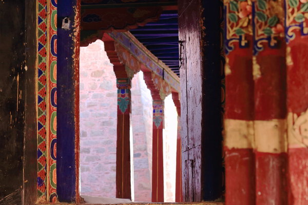 Wooden pillars. Drepung monastery-Tibet. 1219