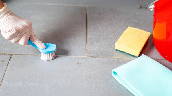 Cleaning tiles in the bathroom. Protection of a tile against a mold and fungi — Stock Photo, Image