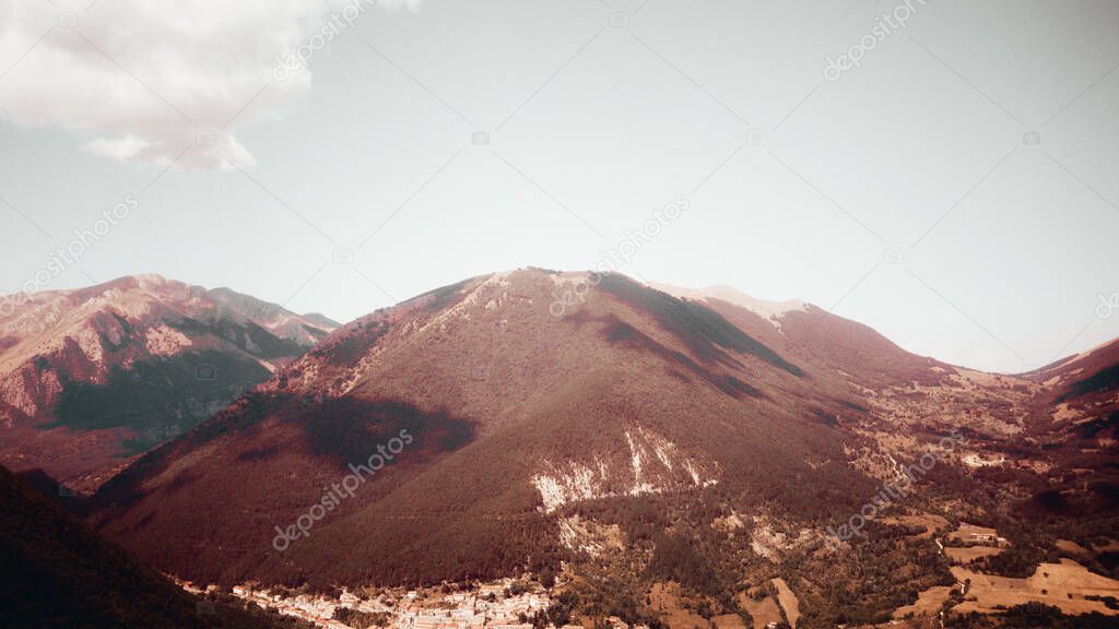 aerial view of a rocky wall and valley in the mountain area italy abruzzo,
