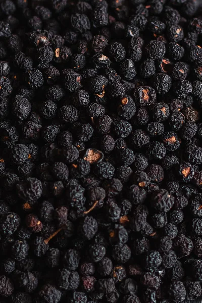 Arka planda karabiber taneleri, biber tohumları, yakın plan makro.