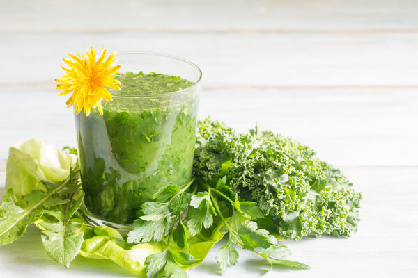 Green smoothie with dandelion healthy lifestyle concept