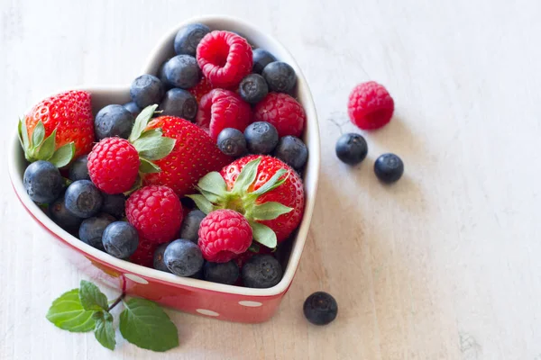 Fresh Blueberries Raspberries Strawberries Heart Shaped Bowl — Stock Photo, Image