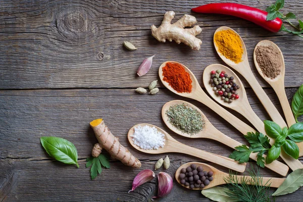 Composition Herbs Spices Wooden Spoons Old Boards Background — Stockfoto