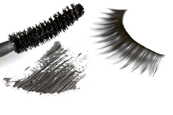Eyelashes and eye shadow cosmetics abstract background
