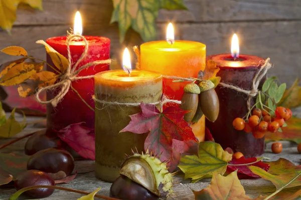 Autumn candles with leaves vintage abstract still life in night — Stock Photo, Image