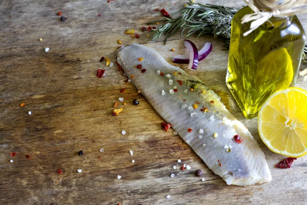 Herring fillet in oil vintage still life food background concept — Stock fotografie