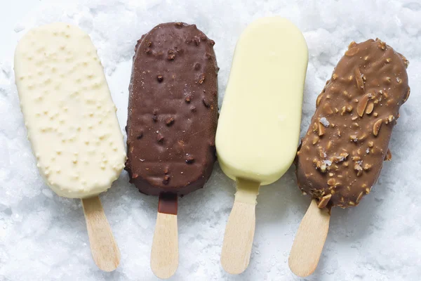 Ice cream on stick in ice — Stok fotoğraf