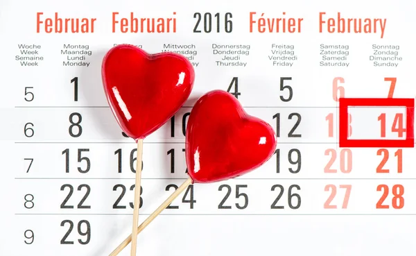 Calendar with candies and red mark — Stock Photo, Image