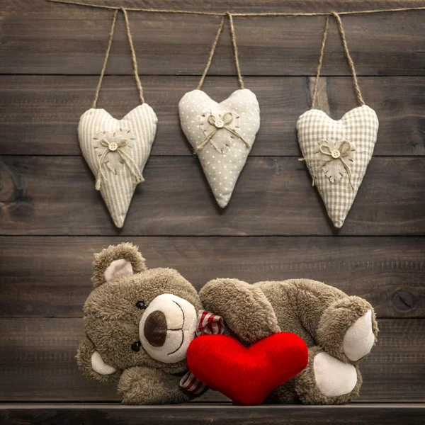 Teddy Bear with Red Hearts Pillows — Stock Photo, Image