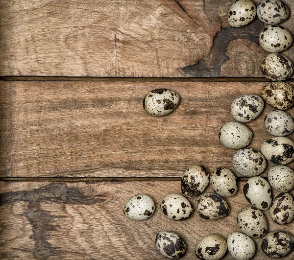 Quail eggs on wooden background. — Stock Photo, Image