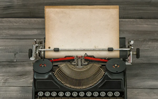 Antique typewriter with grungy paper page — Stock Photo, Image