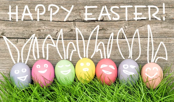 Funny bunnies smiling easter eggs — Stock Photo, Image