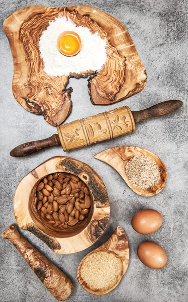 Baking utensils and ingredients on kitchen table — Stock Photo, Image