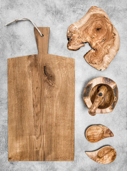 Cutting board and wooden kitchen utensils
