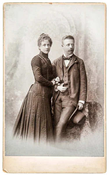 Antique family portrait man and woman wearing vintage clothing — Stock Photo, Image