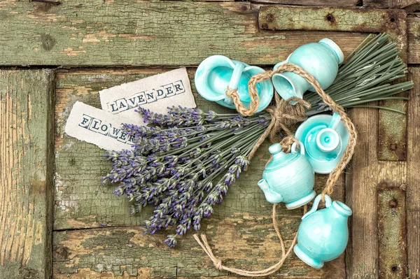 Fresh lavender flowers over rustic wooden background — Stock Photo, Image