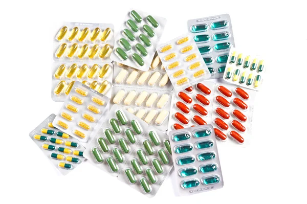 Kleurrijke geassorteerde pillen en capsules — Stockfoto