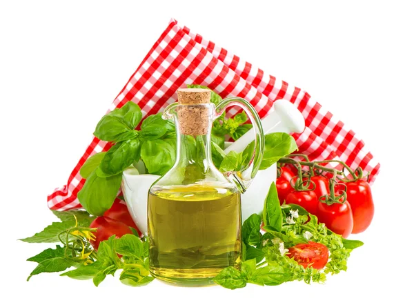 Olive oil with fresh basil leaves and tomatoes isolated on white — Stock Photo, Image