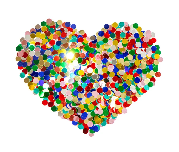 Confetti background in heart shape isolated on white — Stock Photo, Image
