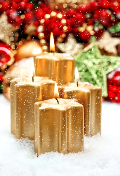 Christmas decoration with four golden burning candles — Stock Photo, Image