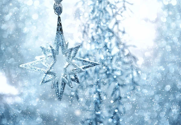 Blue shiny star. christmas or new year decoration — Stock Photo, Image