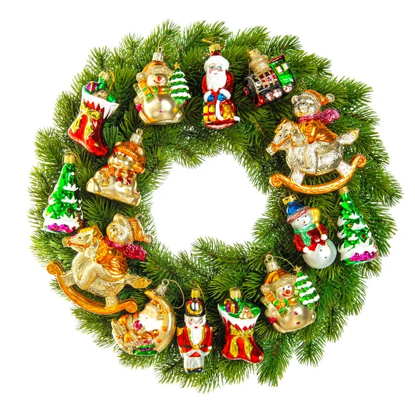 Christmas wreath decorated with ornaments, baubles and toys — Stock Photo, Image