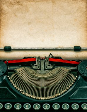 Vintage typewriter with textured grungy paper clipart