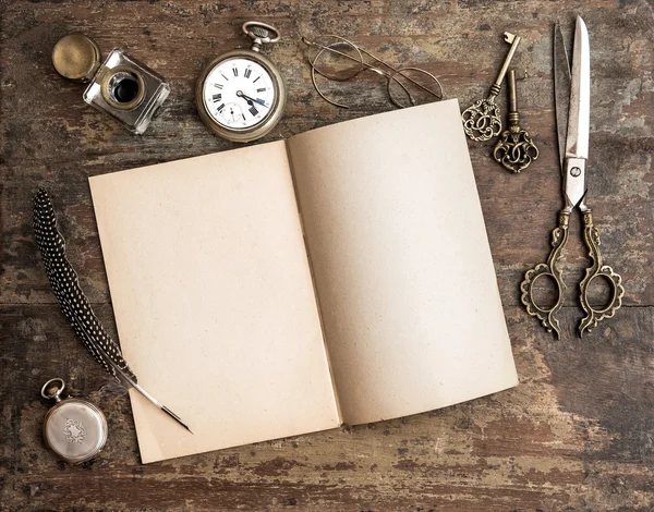 Open diary book and antique writing tools — Stock Photo, Image