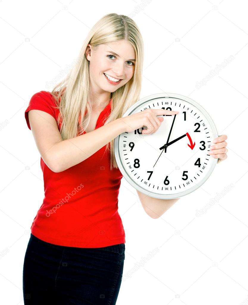 Time management concept. Daylight Saving Time. Young smiling wom