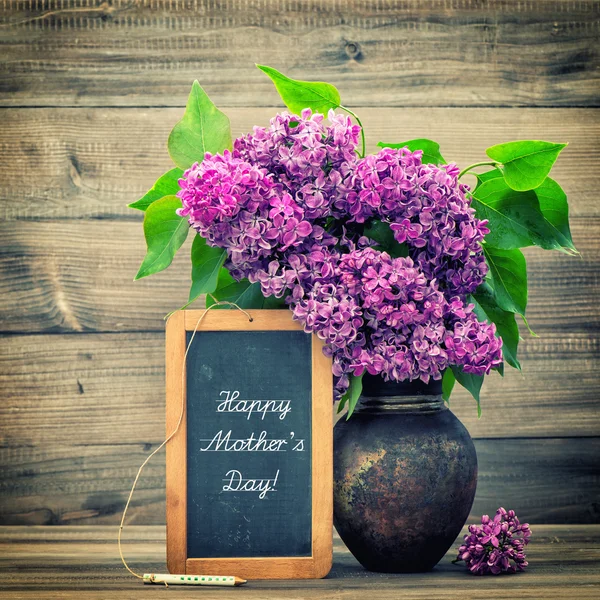 Lila bloemen. Happy Mother's Day — Stockfoto