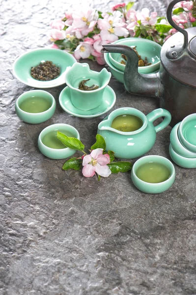 Teapot and cups on stone table. Asia style stil life — Stock Photo, Image