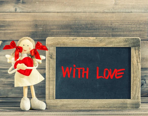 Sweet girl with Red Heart. Holidays decoration. Blackboard — Stock Photo, Image