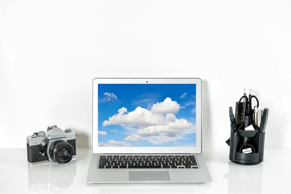 Working station with office supplies and analoge vintage Camera — Stok fotoğraf