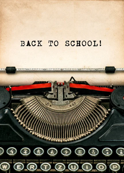 Antique typewriter with aged textured paper sheet Back to school — Φωτογραφία Αρχείου