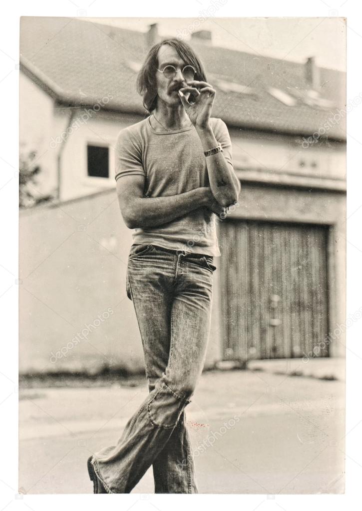 Vintage photo from young fashion smoking man